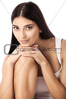 Closeup portrait of a gorgeous young woman over white