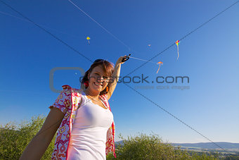Smiling girl with kite