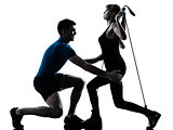 aerobics intstructor  with mature woman exercising silhouette