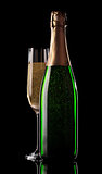 Glass and bottle of champagne