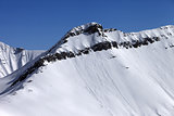 Off piste slope with traces of avalanches