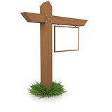 Wooden signboard in the grass
