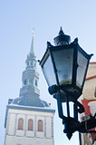 City street lantern on a background of church Niguliste