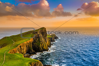 Colorful ocean coast sunset at Neist point lighthouse, Scotland