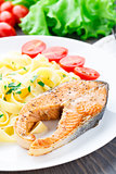 Delicious fettuccini with fried salmon