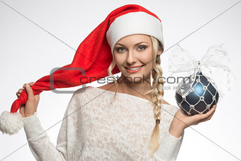 happy girl with santa claus hat 