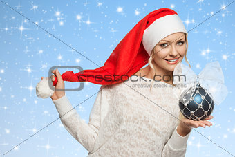 smiling girl with santa claus hat 