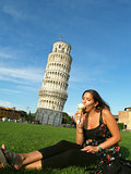 Beautiful girl in front of the tower of Pisa