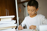 little boy writing