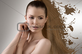 close-up portrait of girl with artistic hair-style