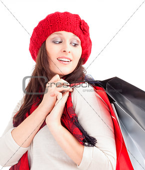 Young Woman in Red Cap with Shopping Bags 