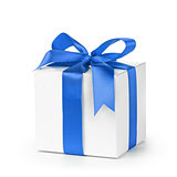 paper gift box wrapped with blue ribbon