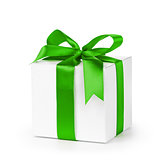 paper gift box wrapped with green ribbon