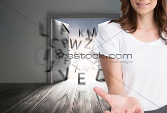 Attractive businesswoman showing her empty hand open