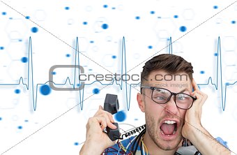 Frustrated computer engineer screaming while on call