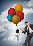 Composite image of cheerful businessman running across businessman captured in light bulb