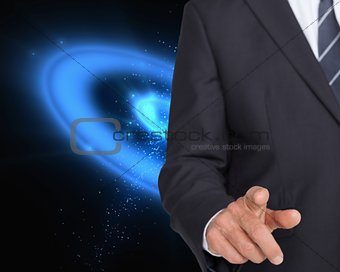 Businessman in suit pointing finger