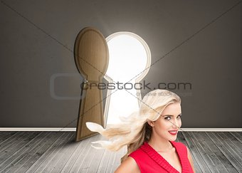 Woman wearing red dress smiling at camera