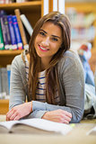 Smiling female student in the college library