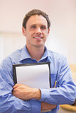 Close up portrait of an elegant male teacher with notepad