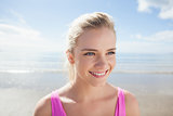 Smiling healthy woman on beach