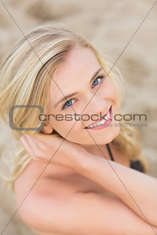 Overhead Close up portrait of smiling blond at beach