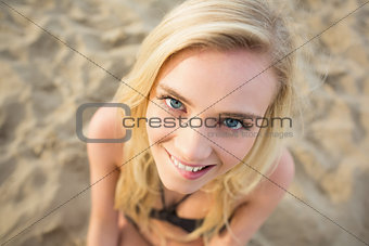 Smiling relaxed young blond at beach