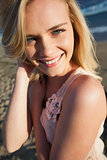 Close up portrait of smiling blond at beach