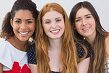 Close up portrait of cheerful female friends