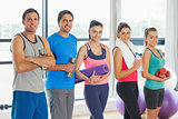 Portrait of a group of fitness class standing in row