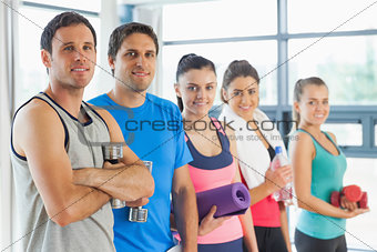 Portrait of a group of fitness class standing in row
