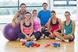 Portrait of fitness class at a bright exercise room