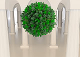 Green natural ball floating in room
