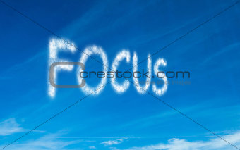 Focus written in white in sky