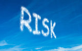 Risk written in white in sky