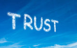 Trust written in white in sky