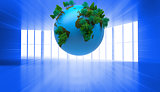 Digitally generated globe on blue background