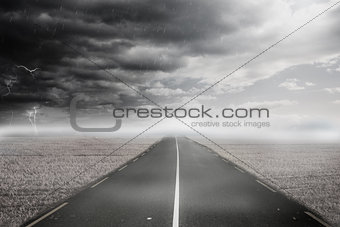 Stormy landscape with street