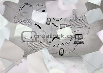 White paper in front of grey wall with graphic