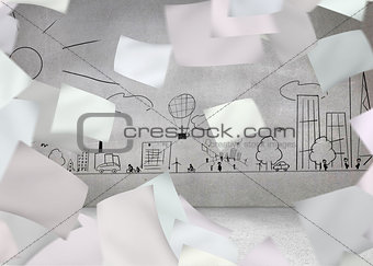 White paper in front of grey wall with cityscape