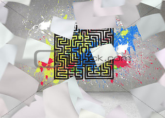 Papers in front of grey wall with maze and splashes
