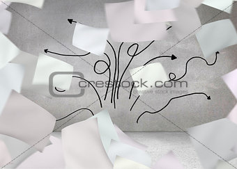 Papers in front of grey wall with arrows