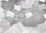 Papers in front of grey wall with comic man