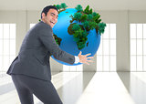 Composite image of businessman catching
