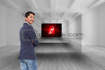 Composite image of casual businessman with arms crossed