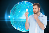 Composite image of model holding a bulb