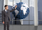 Composite image of businessman holding something up in the air