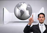 Composite image of unsmiling businessman pointing