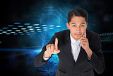 Composite image of thoughtful businessman pointing