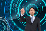 Composite image of serious businessman pointing